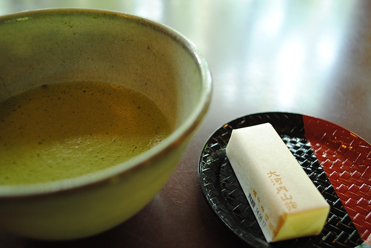 Matcha Tea and small tea cake for matcha tea ceremony