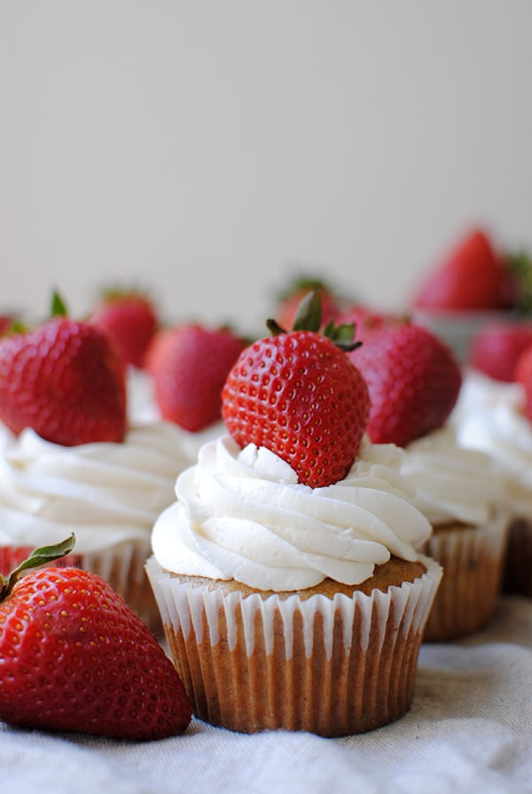 Strawberry Cupcakes: This homemade strawberry cupcake recipe is made from scratch with fresh strawberries and topped with vanilla buttercream!