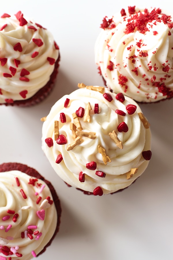 Red Velvet Cupcakes with cream cheese frosting and valentine sprinkles