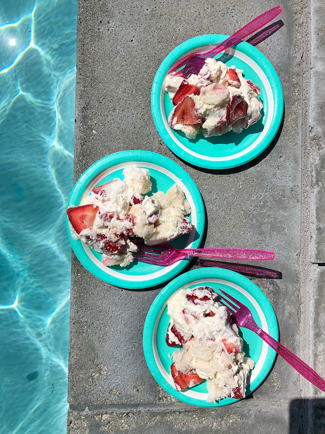 Strawberry Champagne Trifle slices near pool