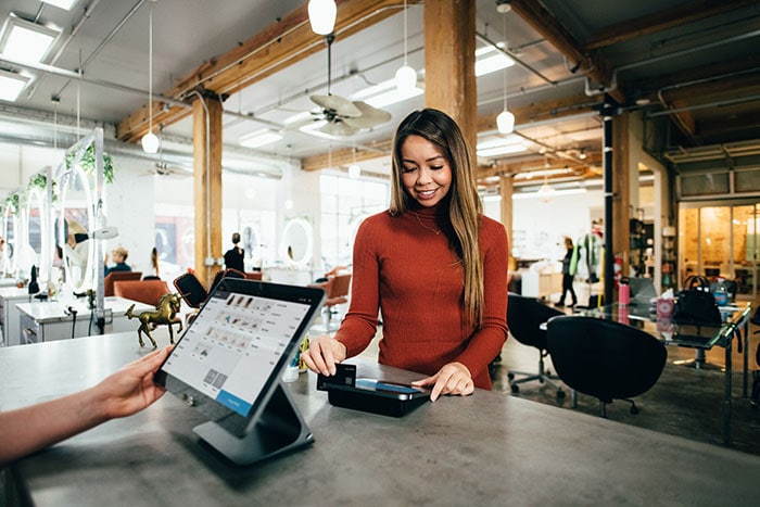 Where to Exchange Currency - woman making purchase at store
