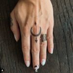 Sagittarius Tattoos -Black arrow on finger