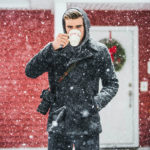 Christmas Captions for Instagram - Cute Guy Drinking Coffee