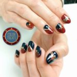 Wonder Woman Nails - red blue and gold nails