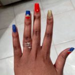 Wonder Woman Nails - red blue and gold nails