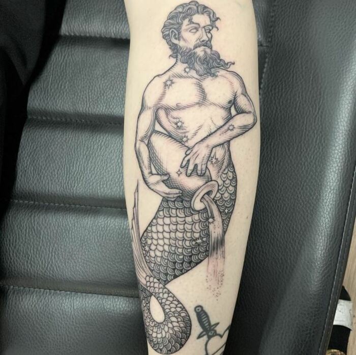 Aquarius Tattoos - black tattoo merman