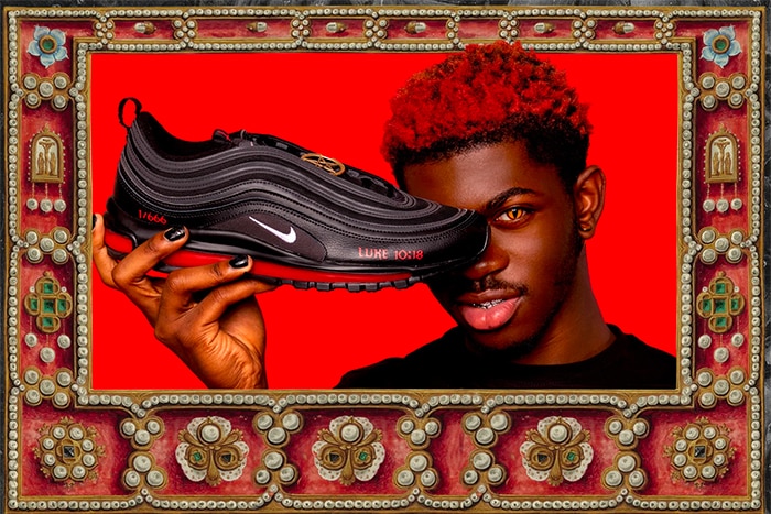 Lil Nas X holding Satan Shoes