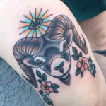 Aries Tattoo - colorful smiling ram ink