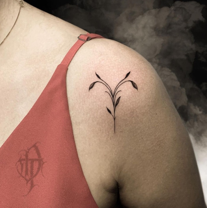 Aries Tattoo - minimalist floral Aries glyph tattoo