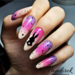 Spring Nail Designs - hot pink and purple speckled neon easter nails with bunny