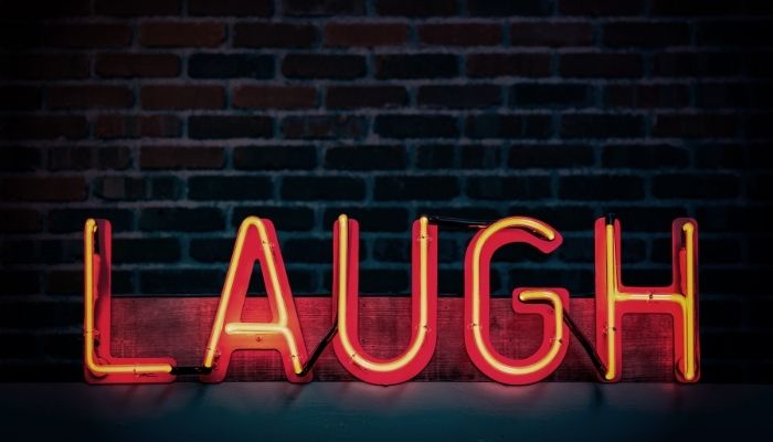 Knock Knock Jokes - laugh sign in neon letters