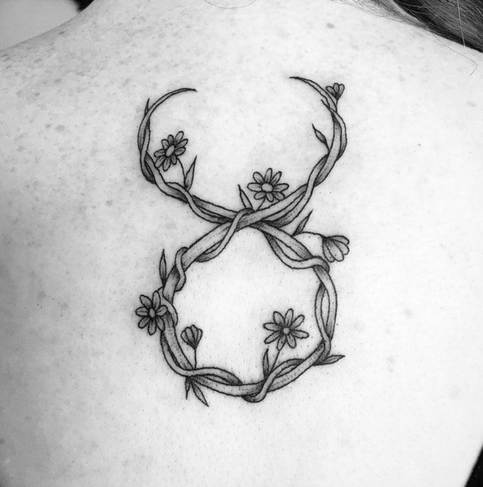 Taurus Tattoos - flowery glyth