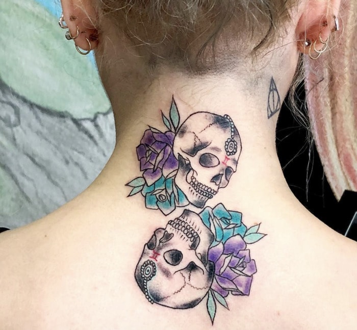 Gemini Tattoos - two skulls with roses