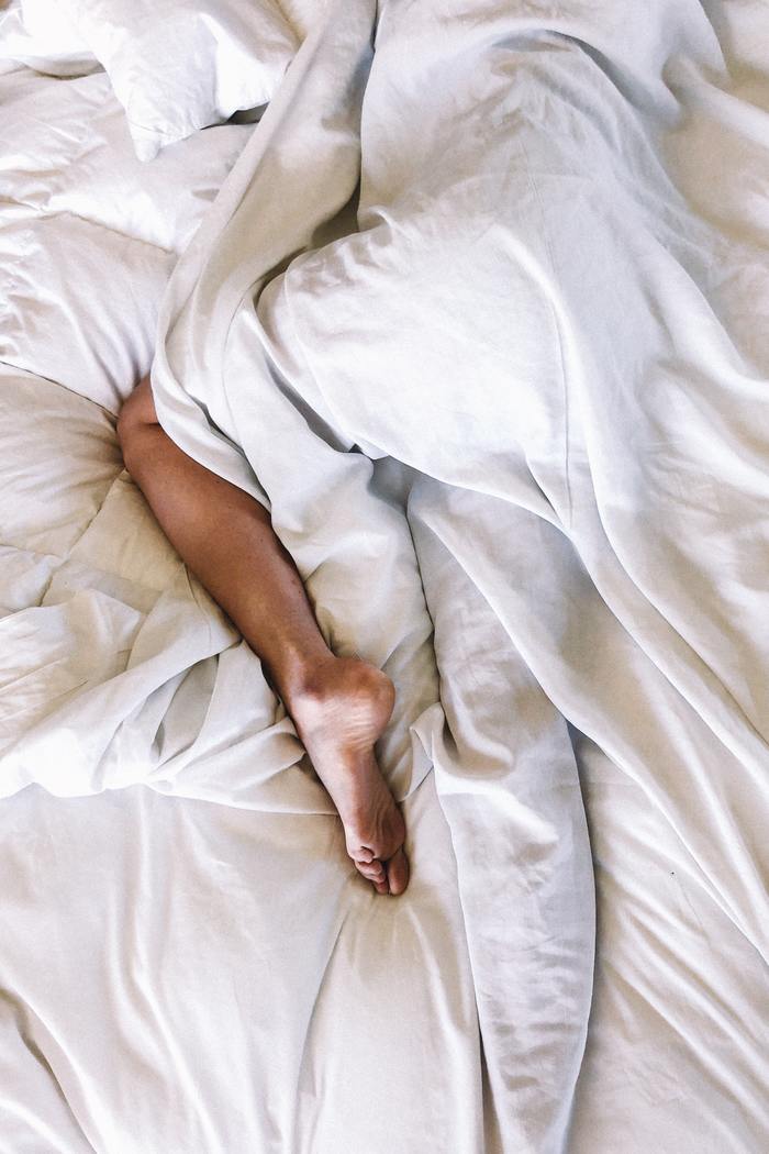 How to Learn What You Like in Bed - woman's leg in bed
