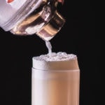 Ramos Gin Fizz - pouring from cocktail shaker