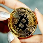Crypto Mistakes - woman holding bitcoin