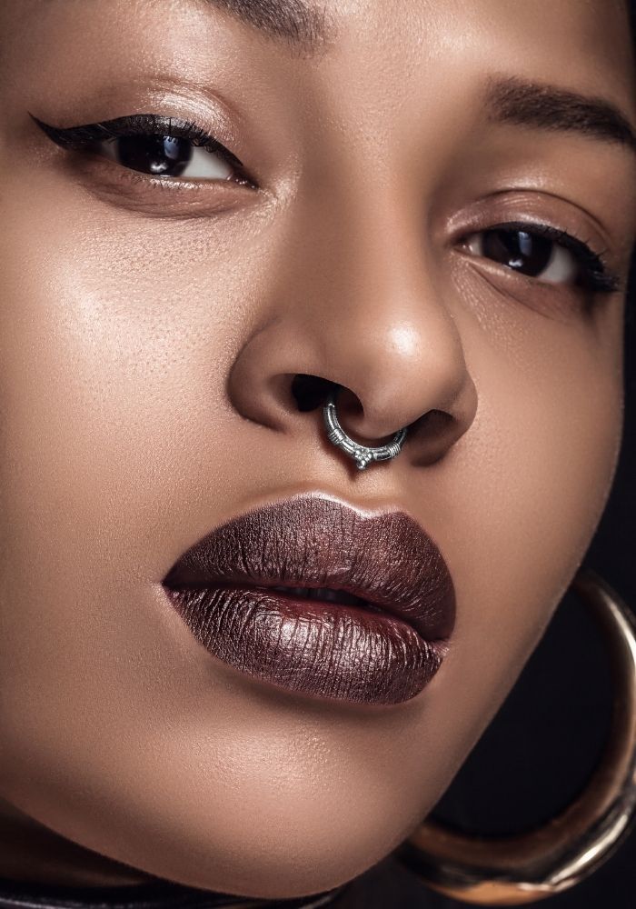 Septum Piercing - woman with nose ring