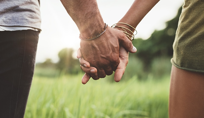 What is Pansexuality - Couple holding hands