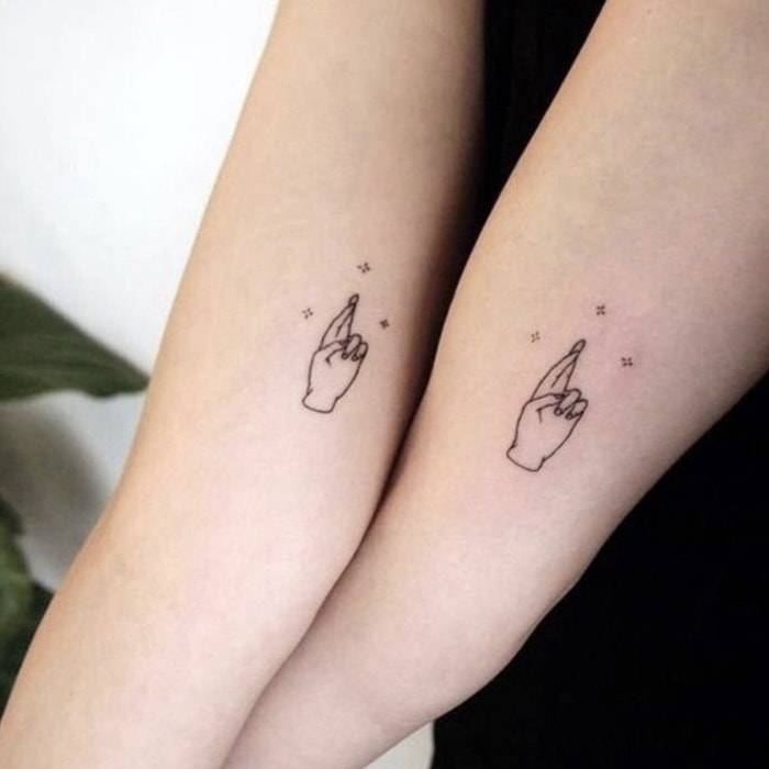 Small Tattoos - fingers crossed