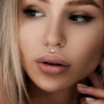 Medusa Piercing - woman with lip piercing