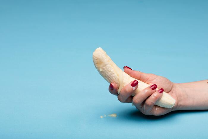 Best Sex Tips - woman holding banana