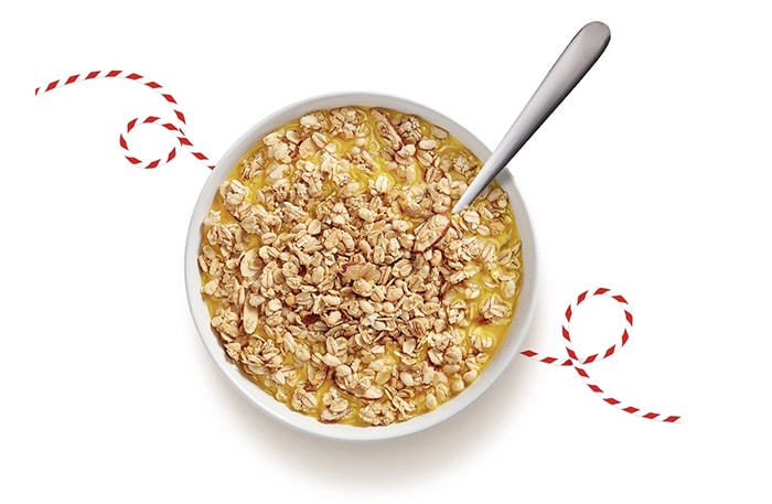 Tropicana Crunch Breakfast Cereal - Bowl with Orange Juice
