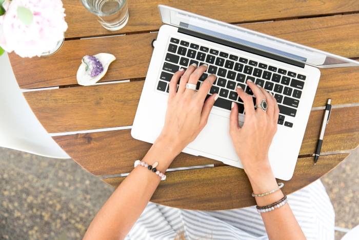 Email sign-offs - woman typing