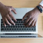 Email sign-offs - man typing
