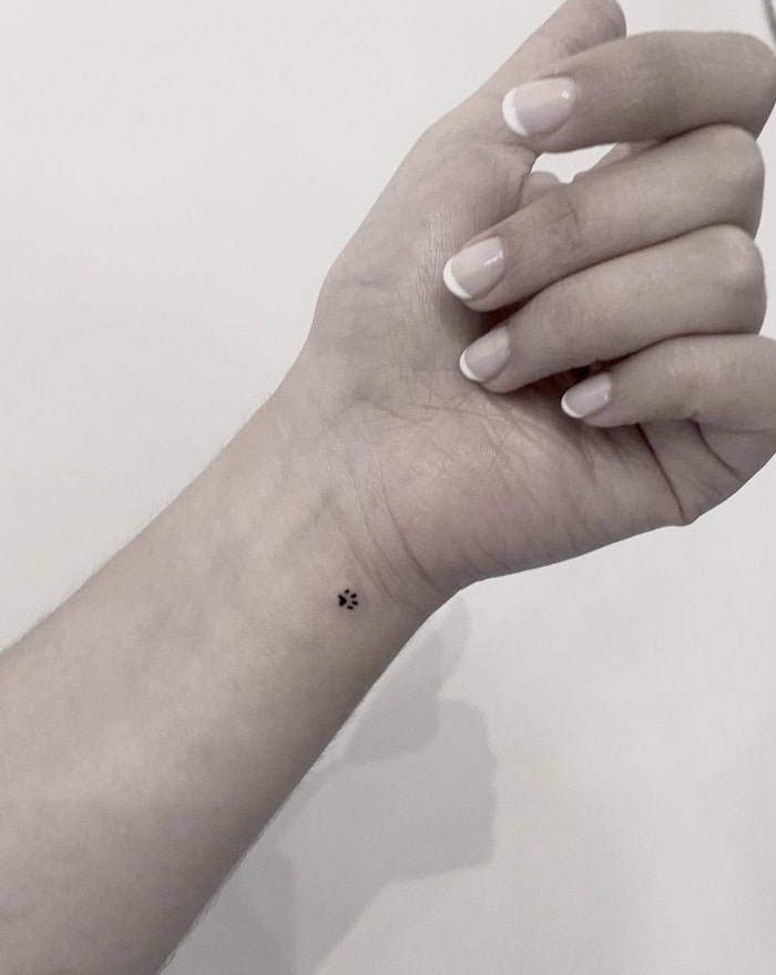 Small Wrist Tattoos - tiny paw print