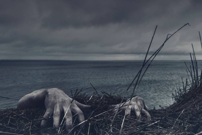 scary stories - hands at ocean