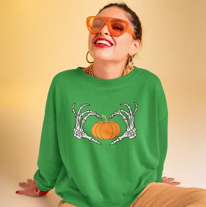 Best Halloween Sweaters - Skeleton Heart Hand