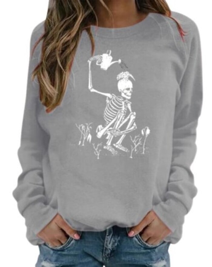 Best Halloween Sweaters - Watering Skeleton