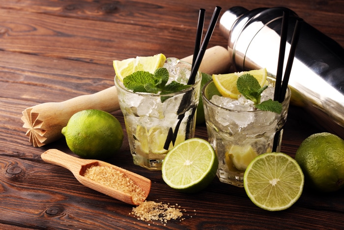 caipirinha recipe - limes on table