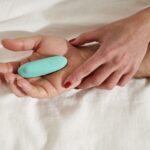 Pegging - woman and man with dildo in bed