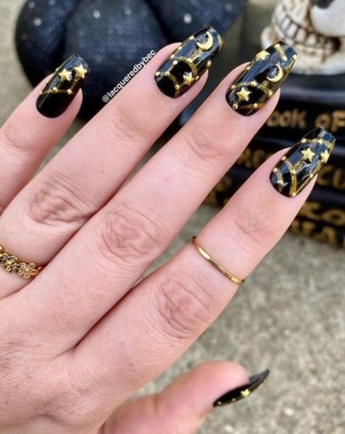 Black Nails - Gold Stars and Moons With a Black Base
