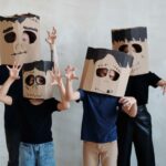 Halloween Puns -four people with ghost headpiece