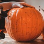 Pumpkin Puns Jokes - carving a pumpkin