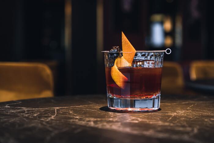 Old Fashioned - cocktail on bar