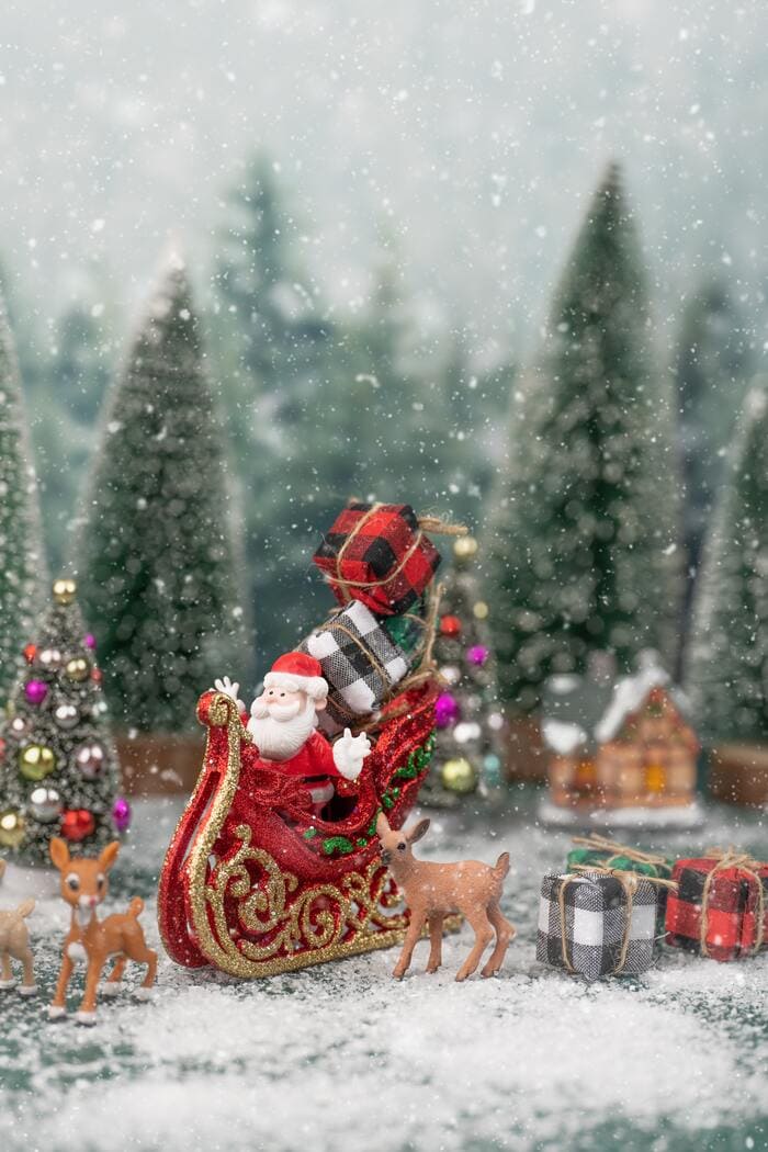 Christmas Puns Jokes - Santa Klaus Carrying Gifts