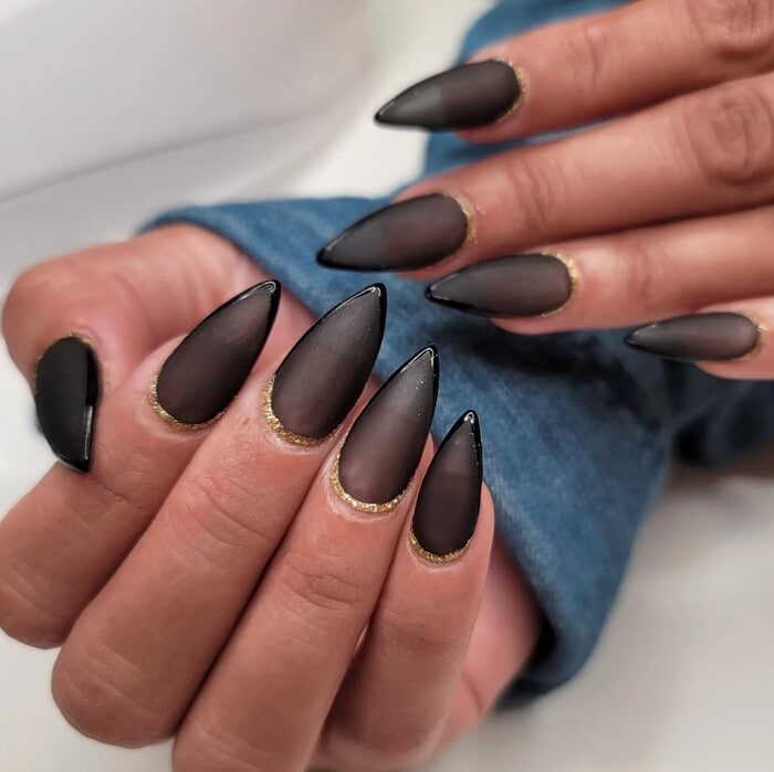 Dark Winter Nails - Black And Gold Reverse French Stiletto Nails