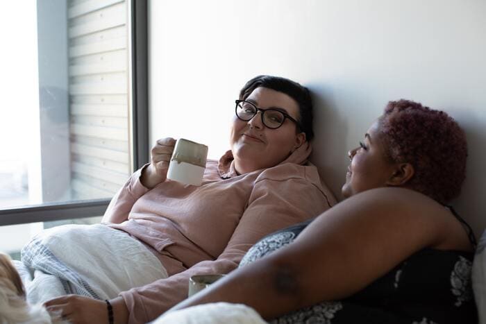 Difference between bisexual and pansexual - diverse couple in bed