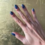 Hanukkah Nail Designs - Blue Nails With Abstract Gold and Silver Candles