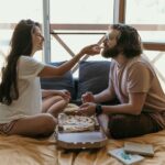 Cheap Valentines Day Ideas - couple eating in bed