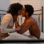 Oral Sex Positions - couple kissing in bed