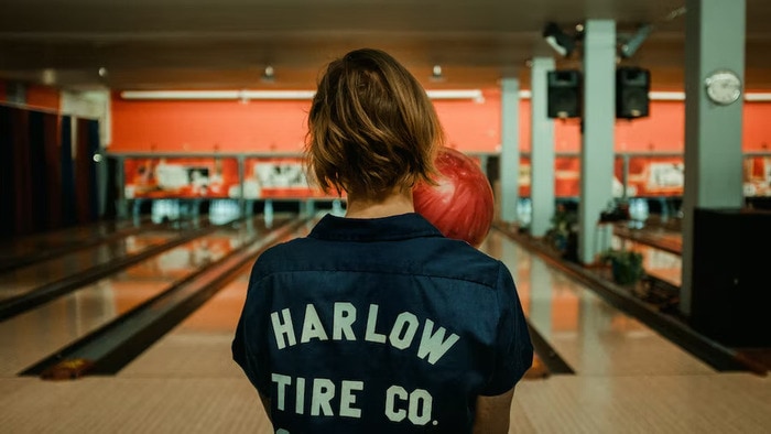 Physically Active Self Care Ideas - woman bowling