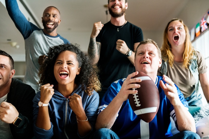Physically Active Self Care Ideas - friends watching sports