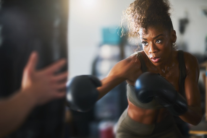 Physically Active Self Care Ideas - woman boxing