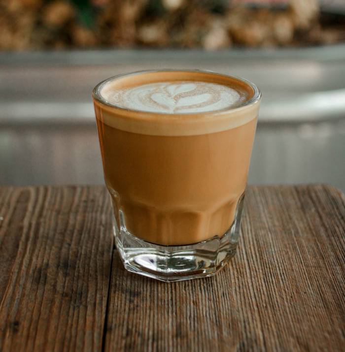 what is a cortado - glass on table