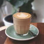 what is a cortado - glass on plate