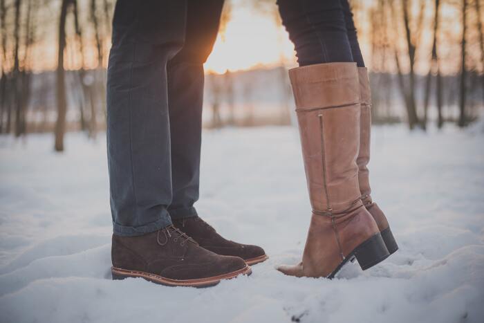 February Horoscope 2023 - couple in snow